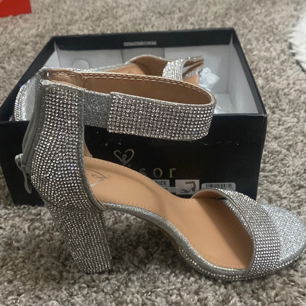 Studded heels. Worn once !